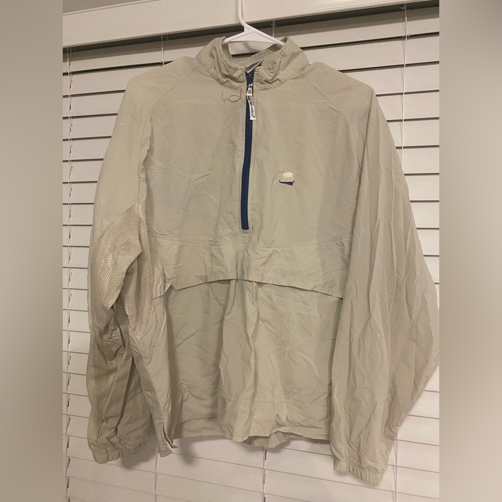 Very comfortable, airy, beige, wind breaker and sun repellent jacket.